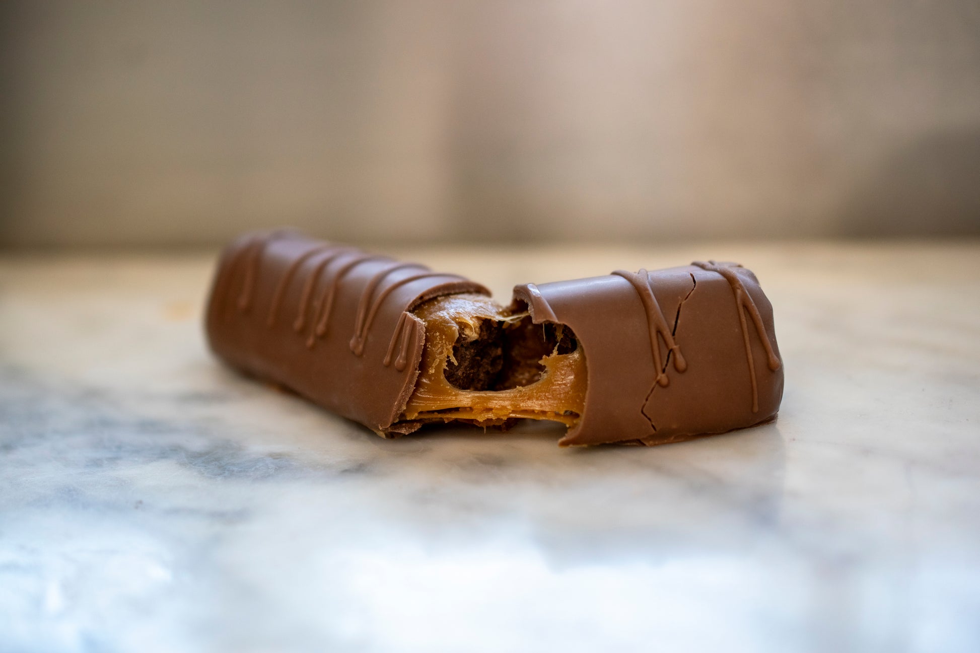 Sliced artisan Irish Surprise Bar showing caramel and airy chocolate nougat, a handmade birthday gifting idea.